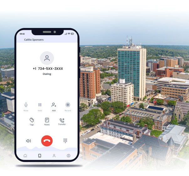 Ann arbor in background with a smartphone dialing 734 area code number