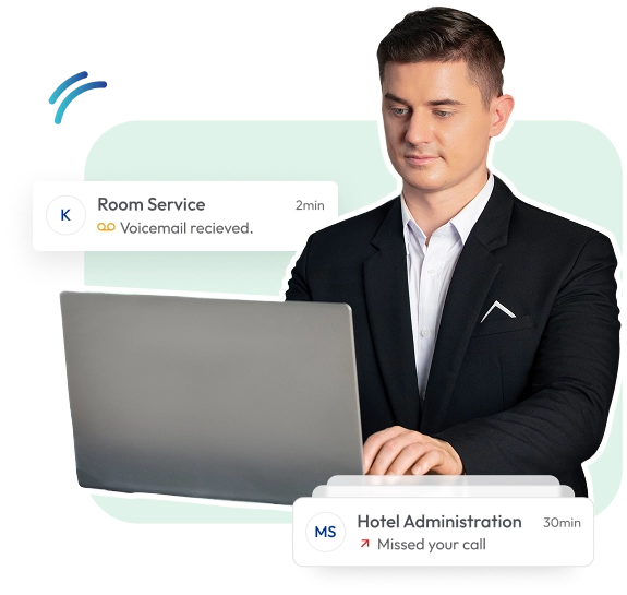 Businessman on laptop receiving hotel service notifications