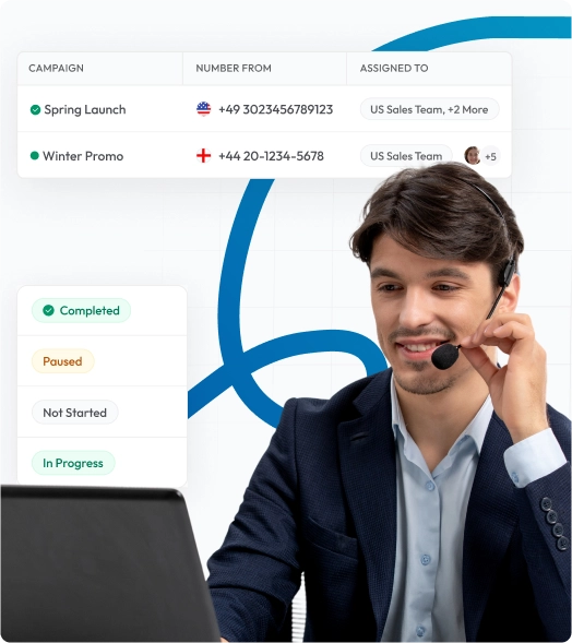 man with headset managing campaigns on a computer